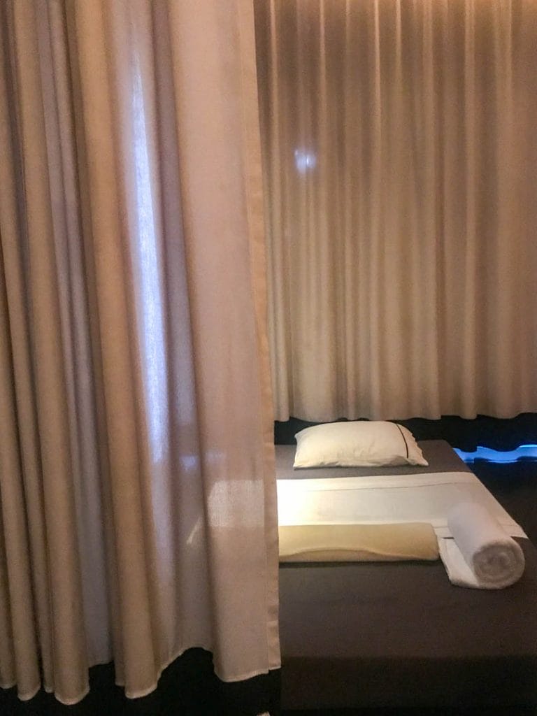 Massage mattress behind curtains