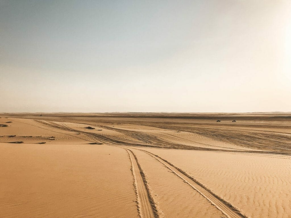 Jeep tracks in a sand dune in Qatar