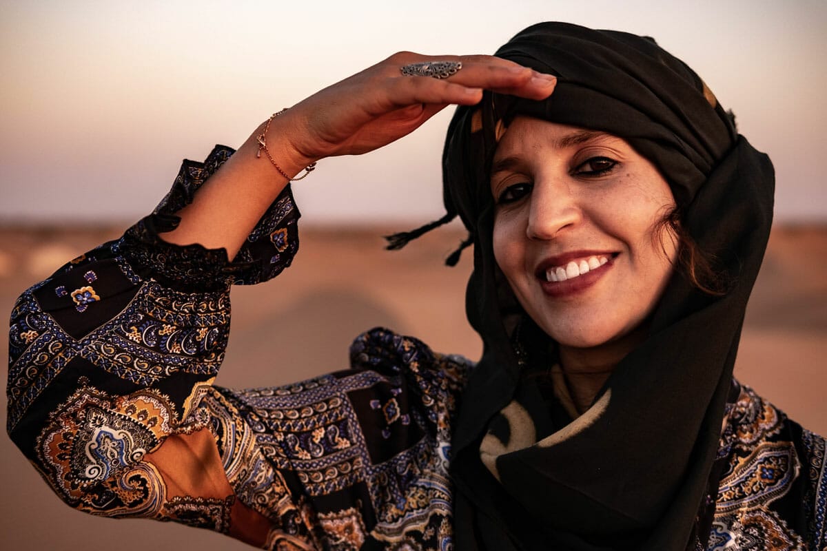 Berber woman smiling in the desert