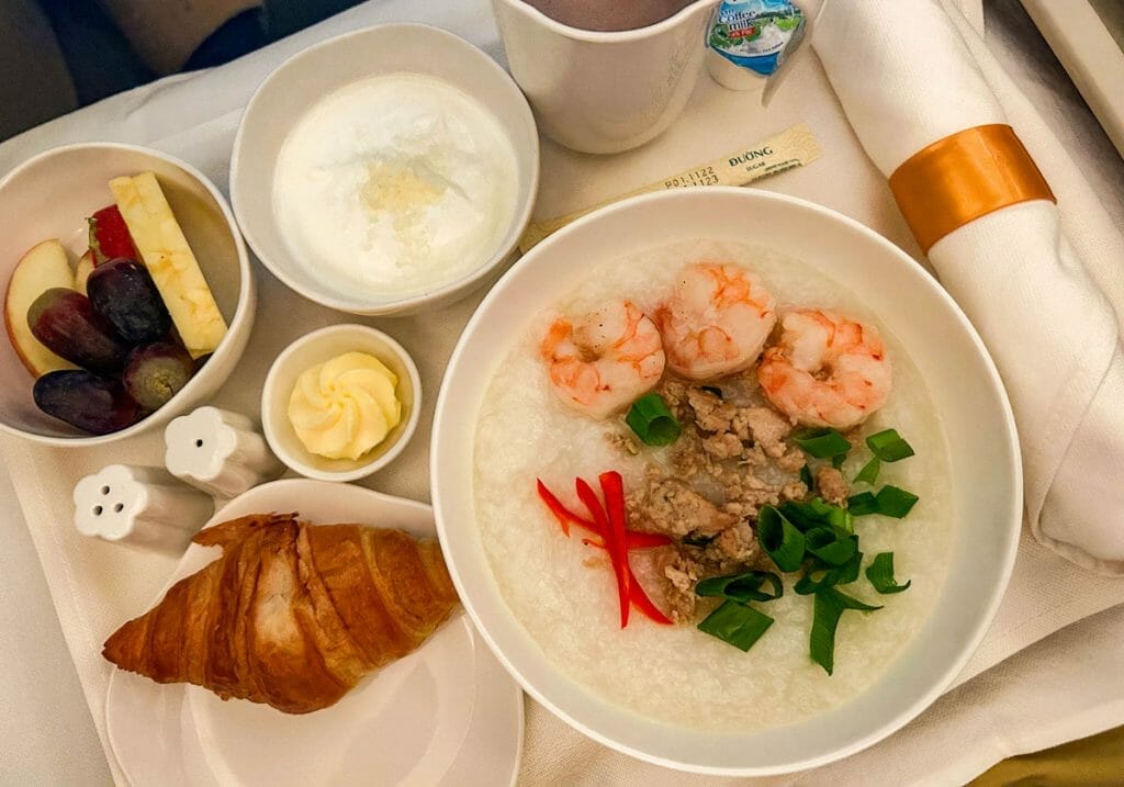 Breakfast tray with vietnamese congee in business class