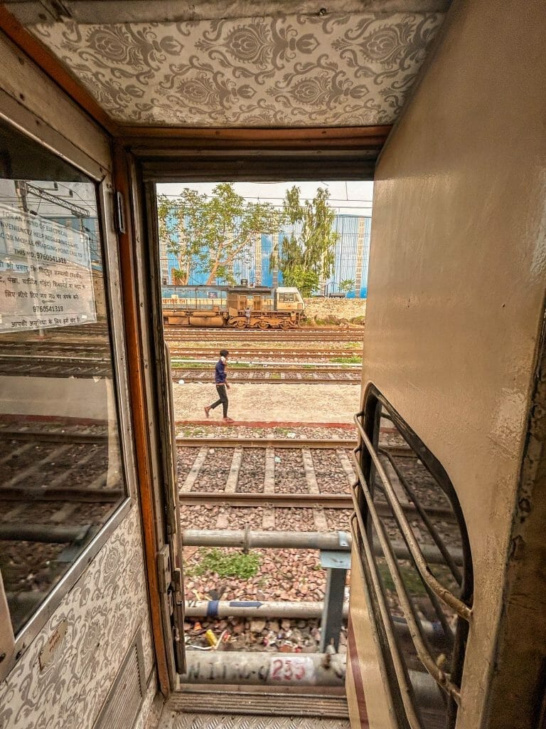 Open door on a moving train in india